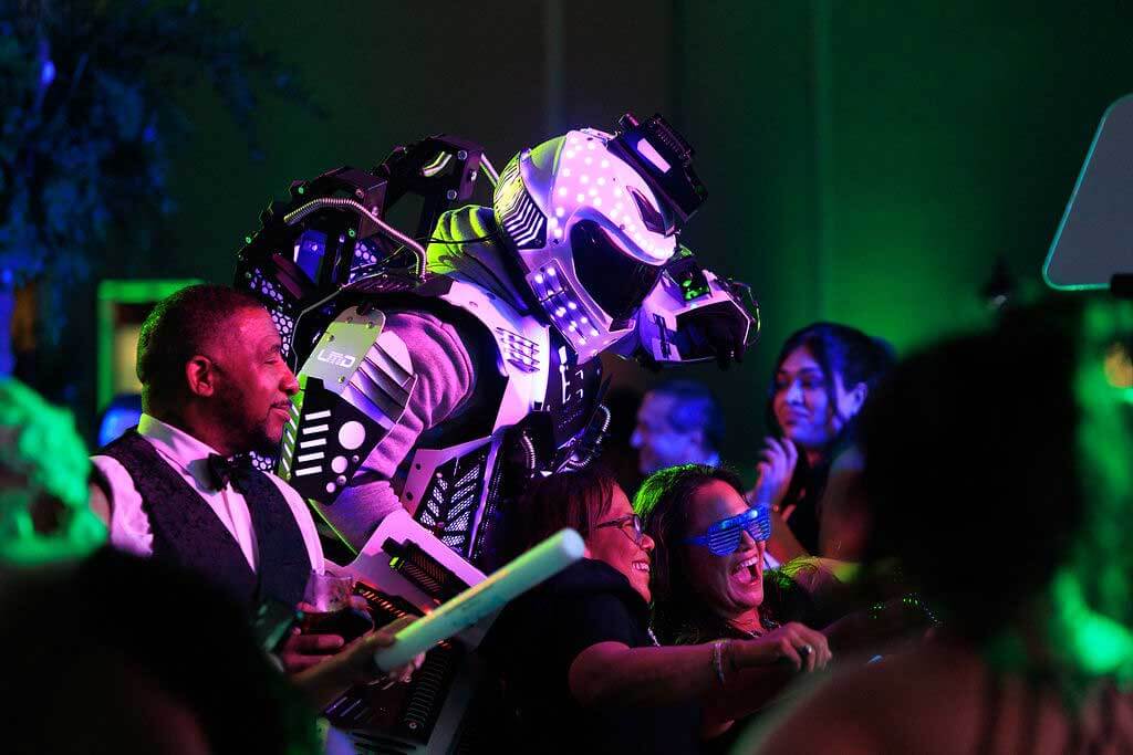 An LED robot performer among guests at the Latino Ball