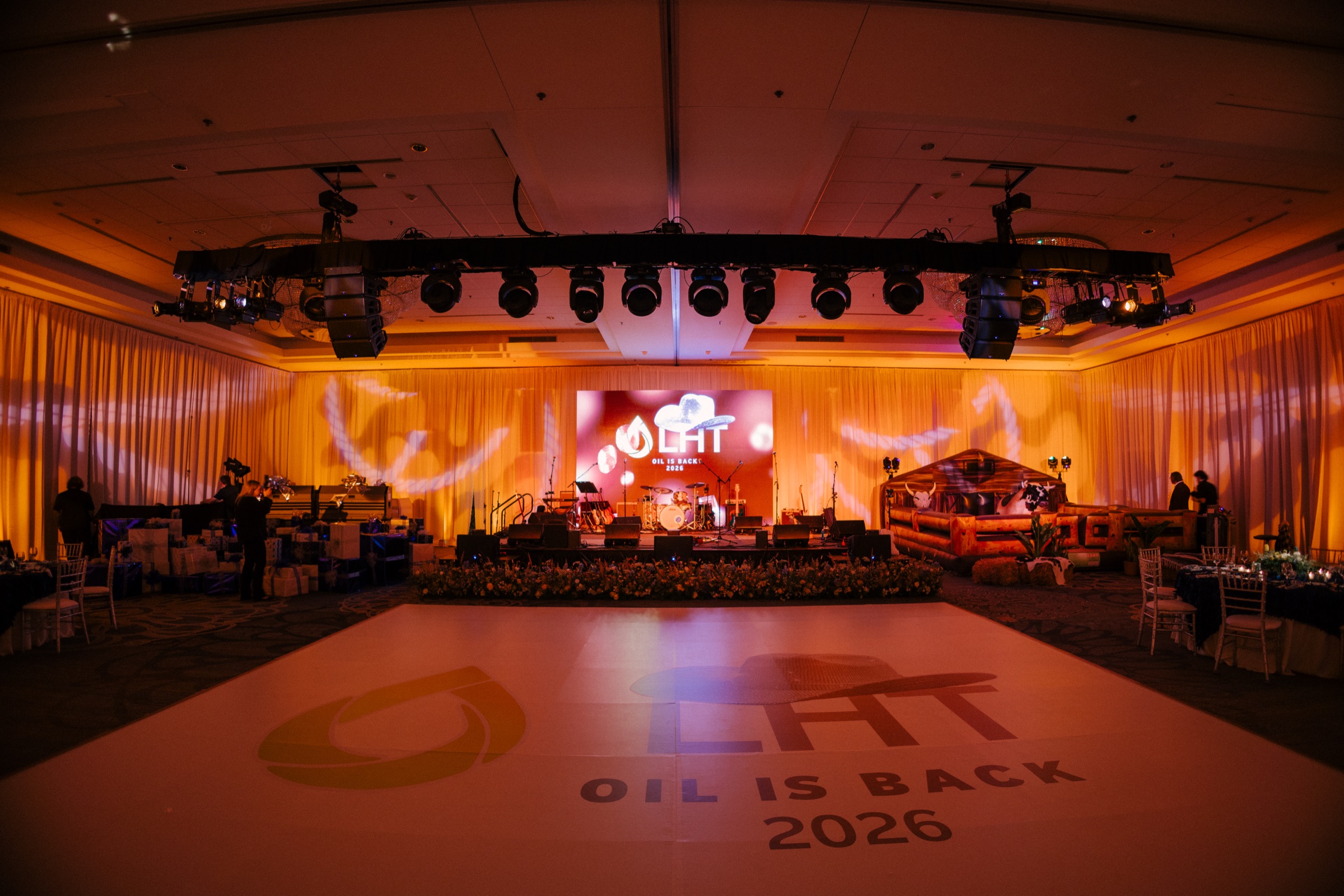 Denim and Diamonds themed event with custom pattern lighting, branded dance floor and live band produced by Klock Events at the Hilton Harrisburg